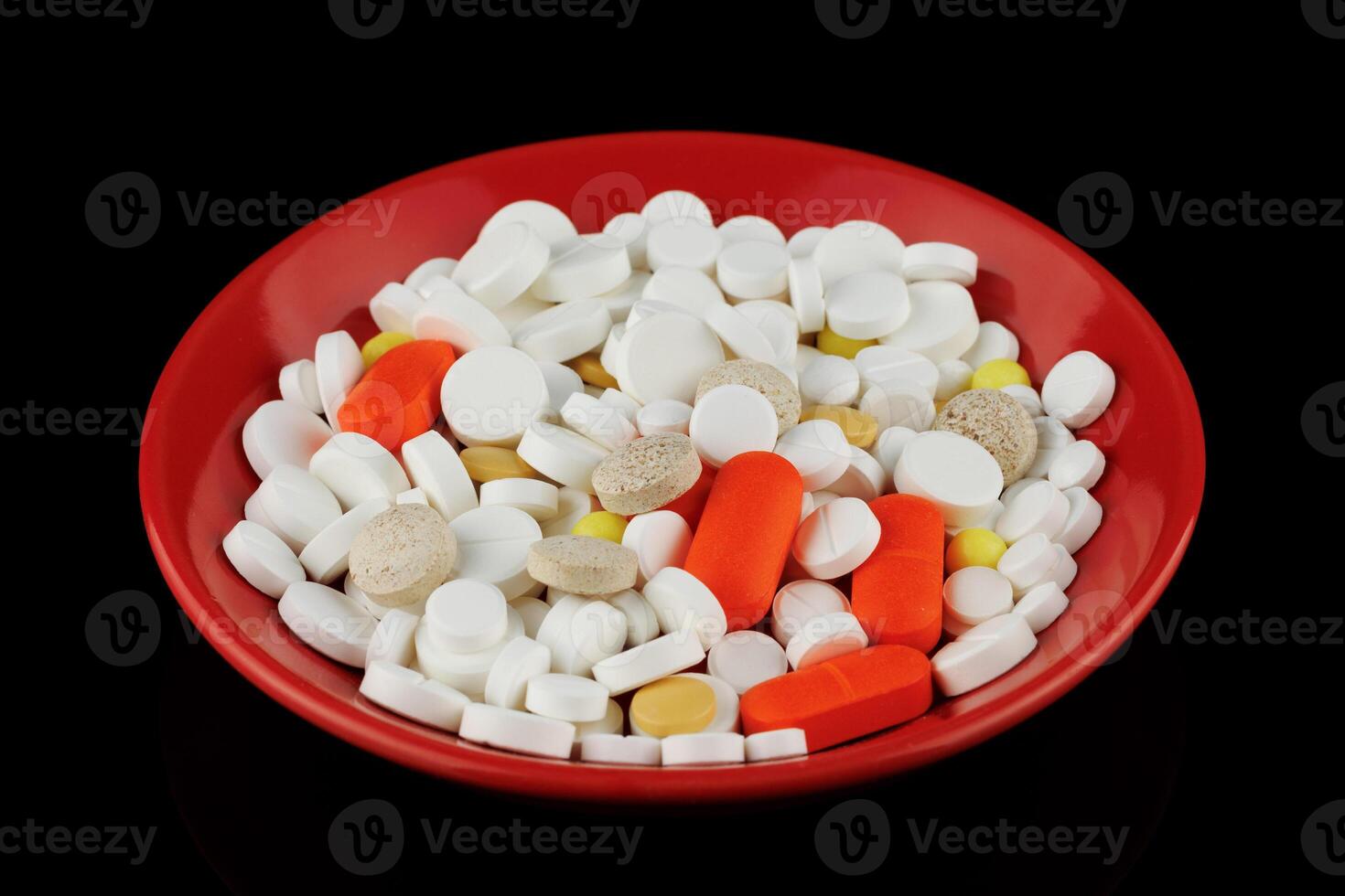 Lots of pills in a pile photo