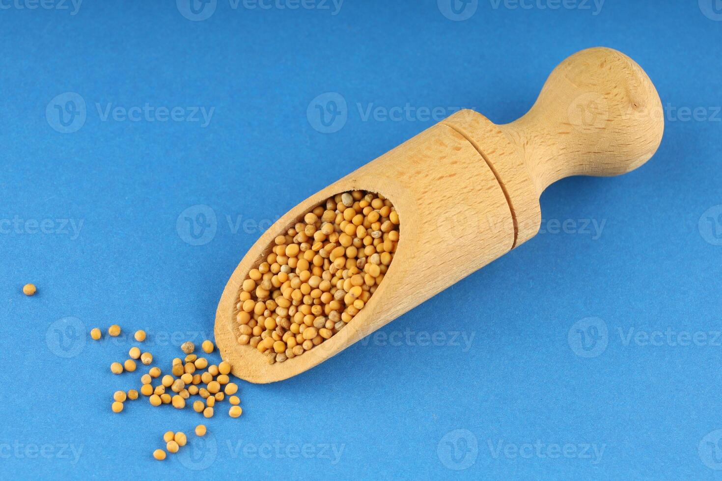 Millet in a wooden scoop photo
