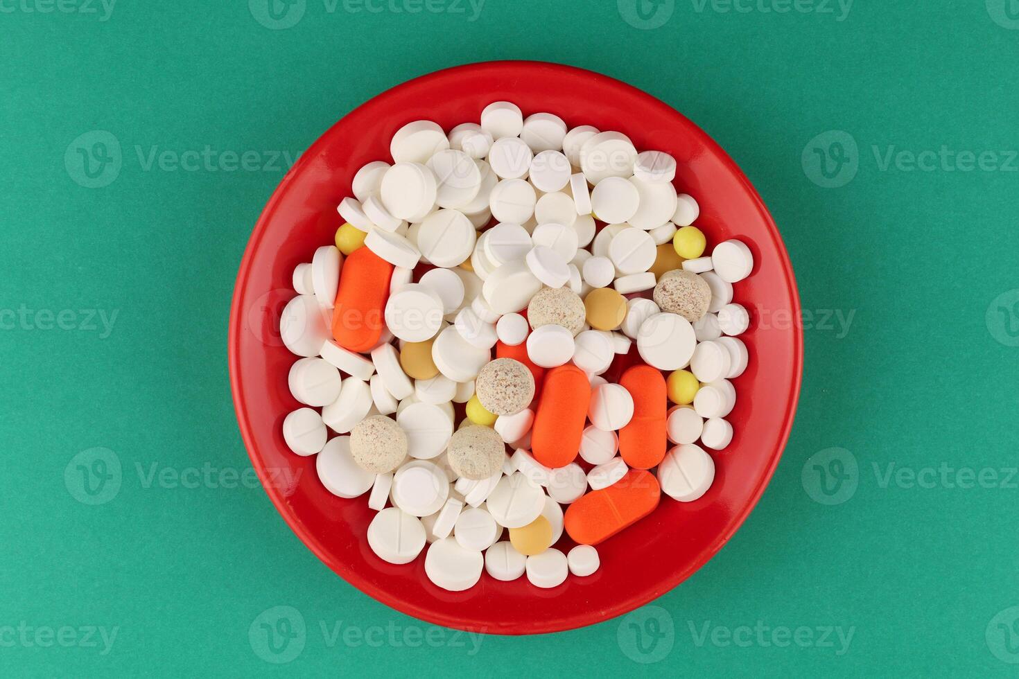 Lots of pills in a pile photo