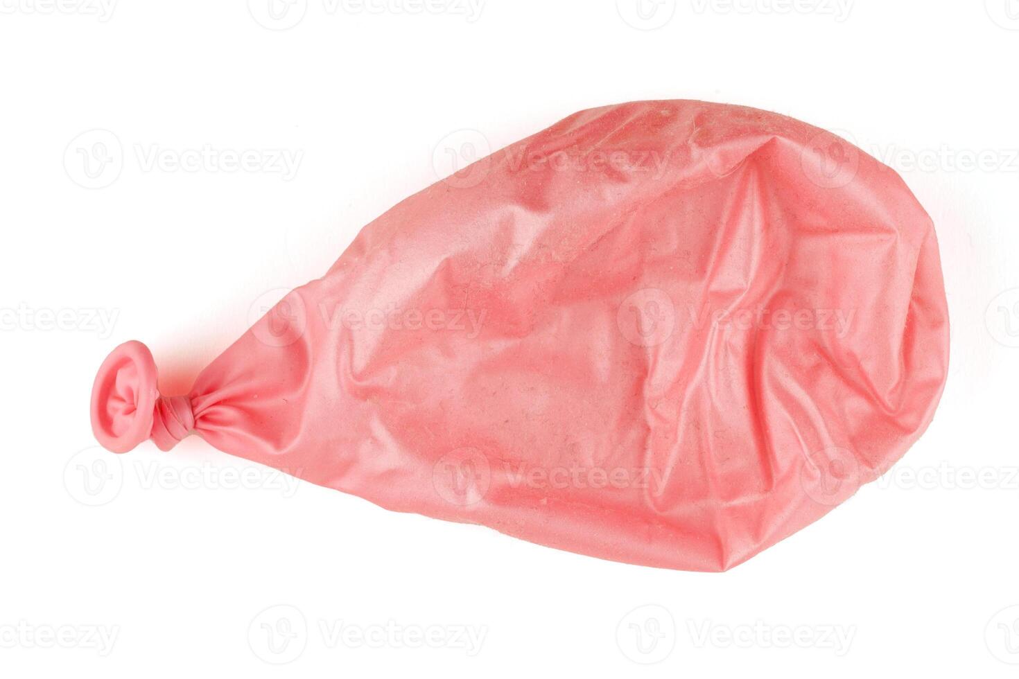 Pink inflated ball with wrinkles photo