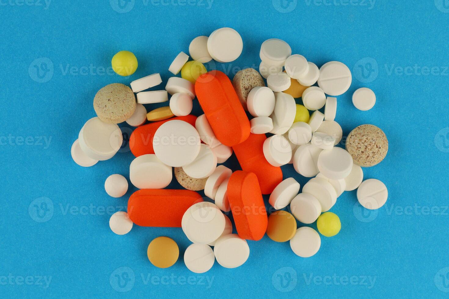 Lots of pills in a pile photo