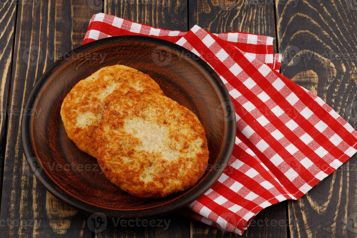 Fish cutlets on a plate photo