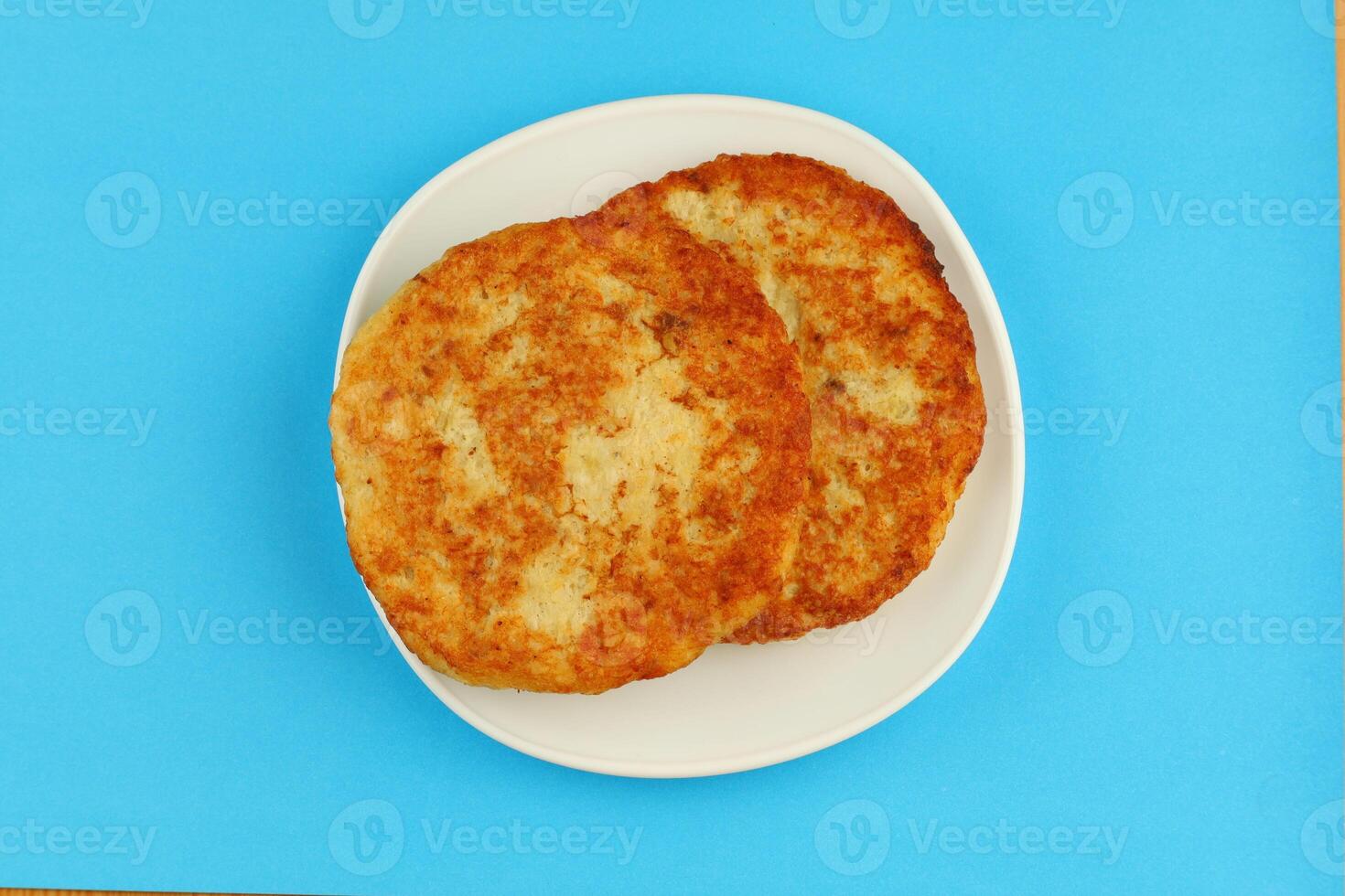 Fish cutlets on a plate photo