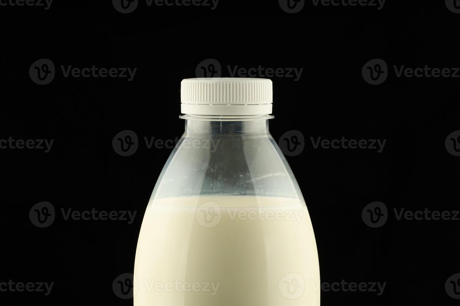 Milk in a plastic bottle photo