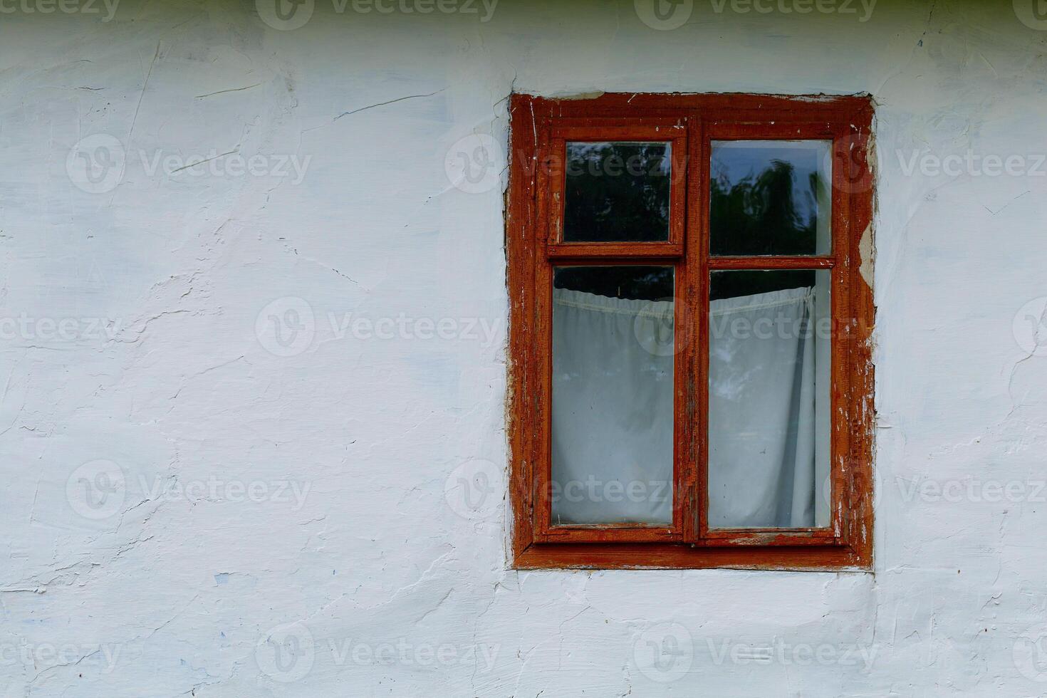 Old window in a clay house. Window minimalism photo