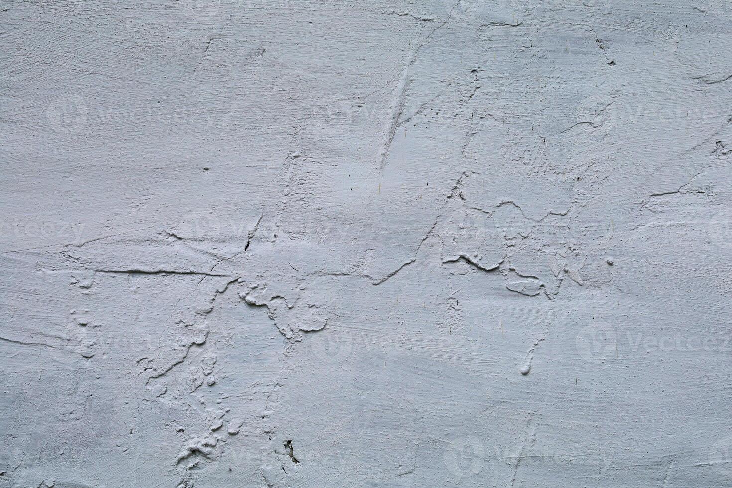 Clay surface. The clay wall is whitewashed with lime photo