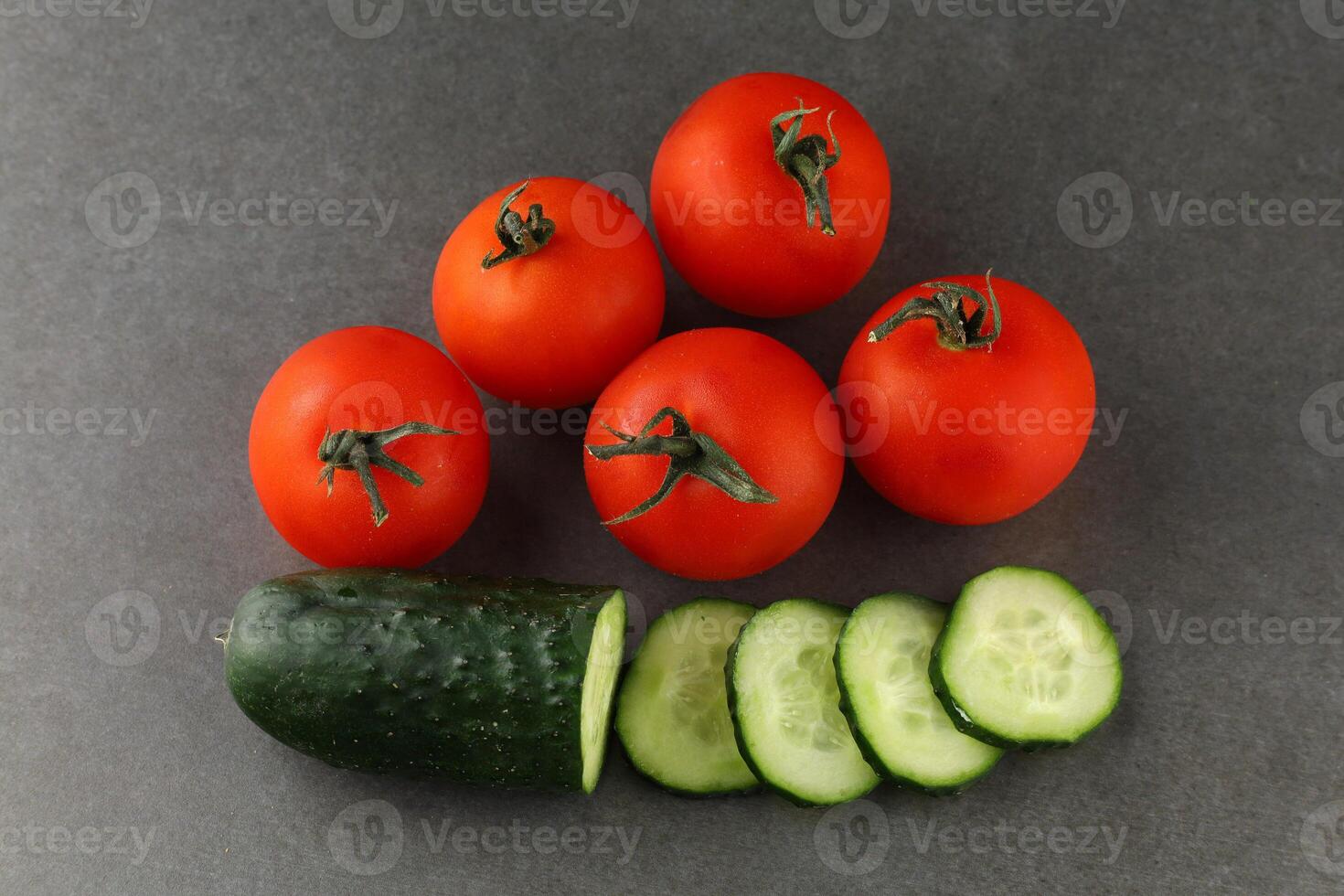 Tomatoes and cucumbers close-up. Food of vegetarians photo