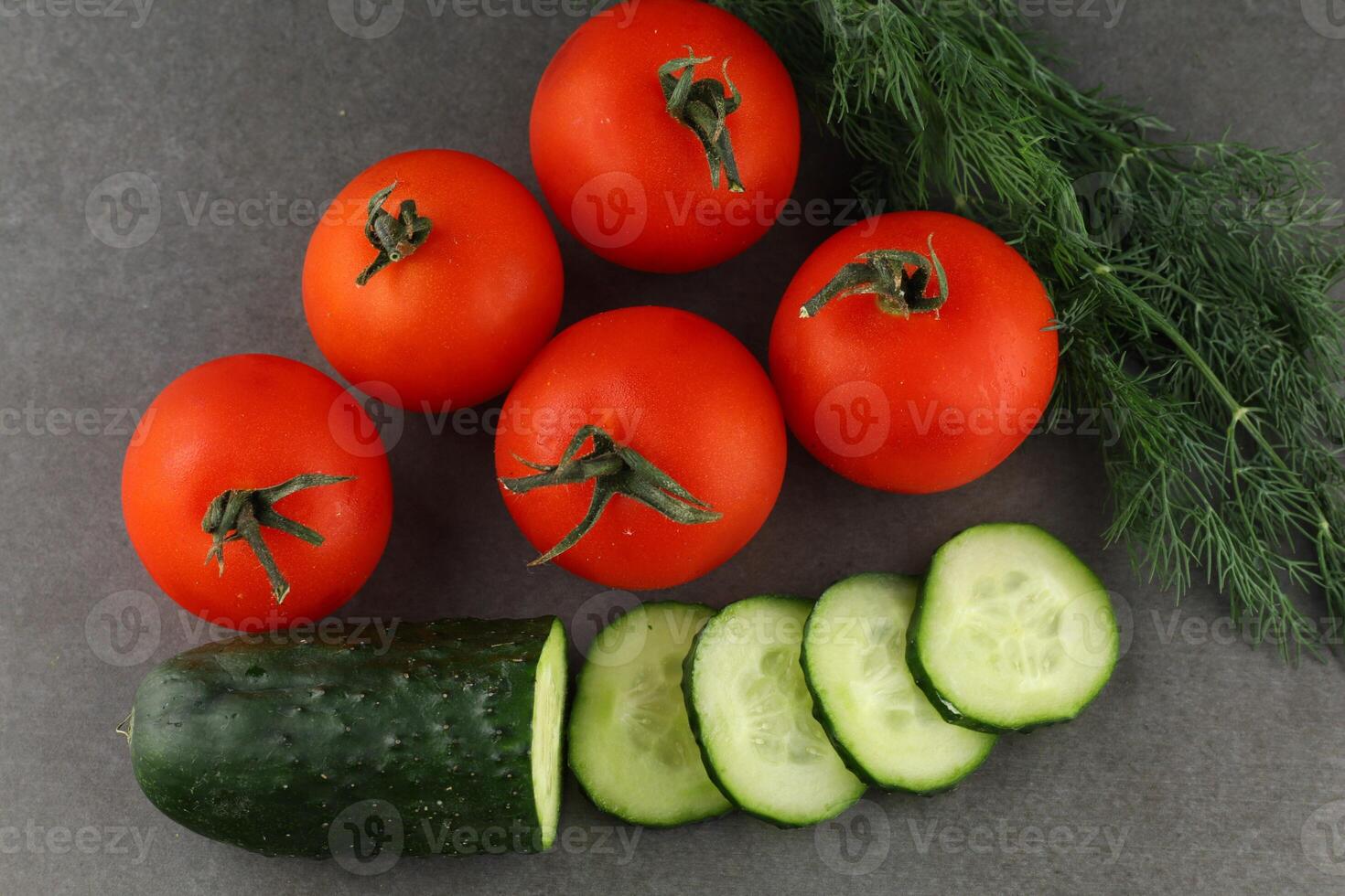Tomatoes and cucumbers close-up. Food of vegetarians photo