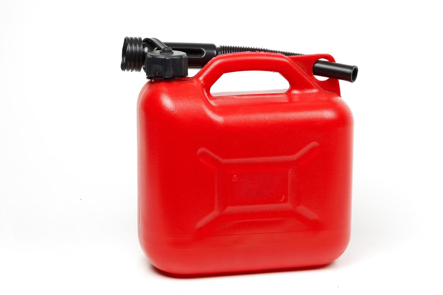 Red plastic canister for fuel isolate photo