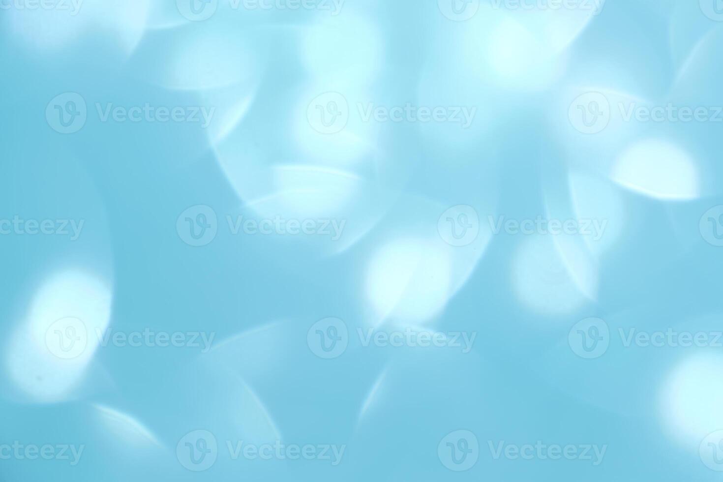 Abstract blue festive christmas background with bokeh. photo