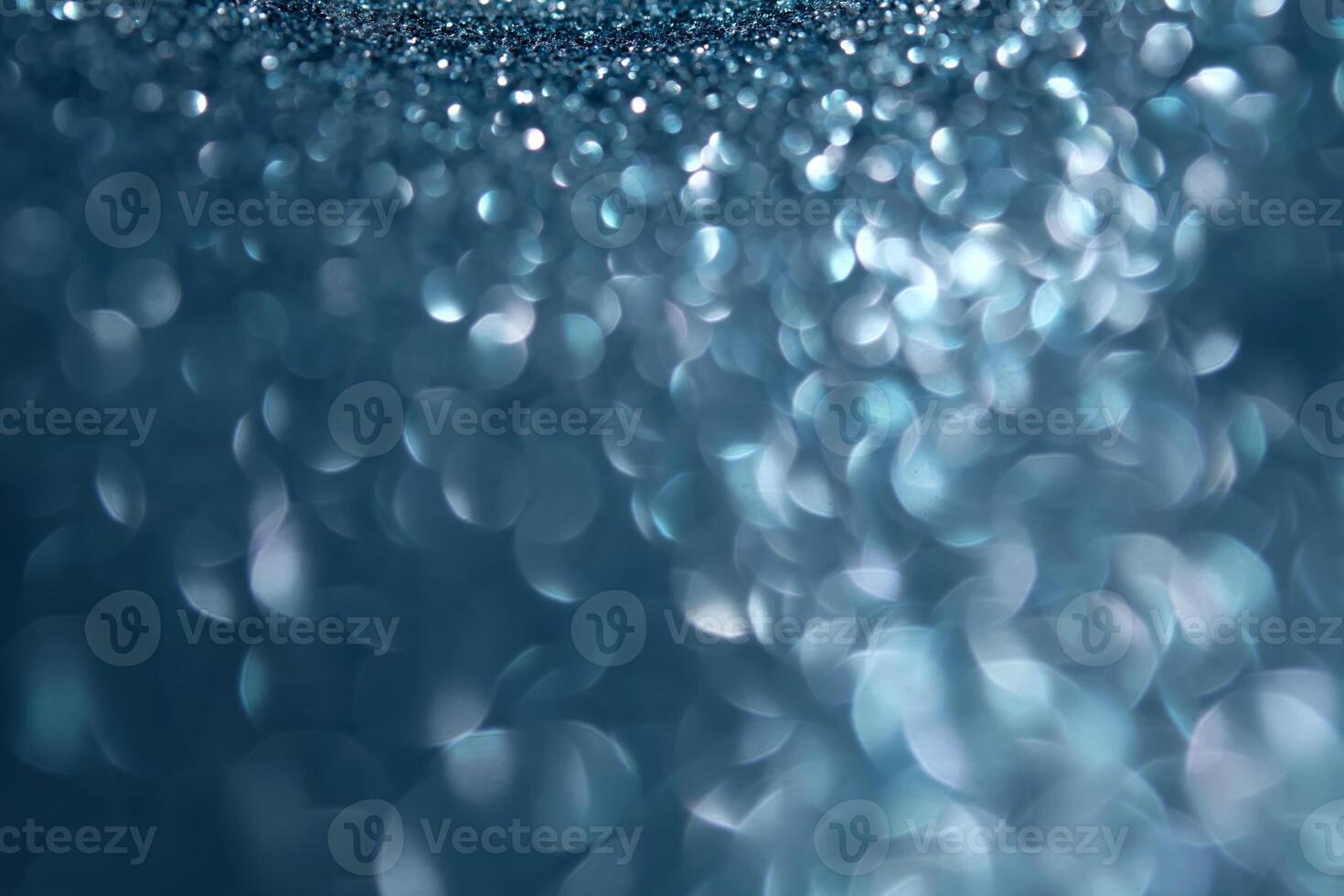 Abstract blue festive christmas background with bokeh. photo