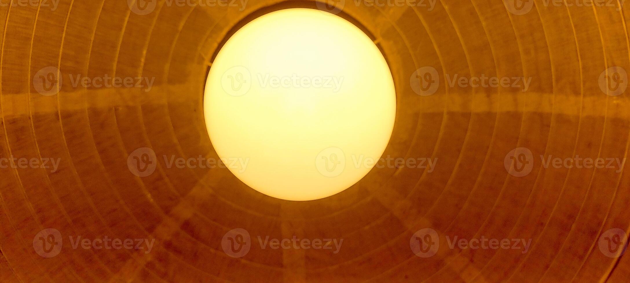 lamp with decorative yellow lamp and chandelier photo