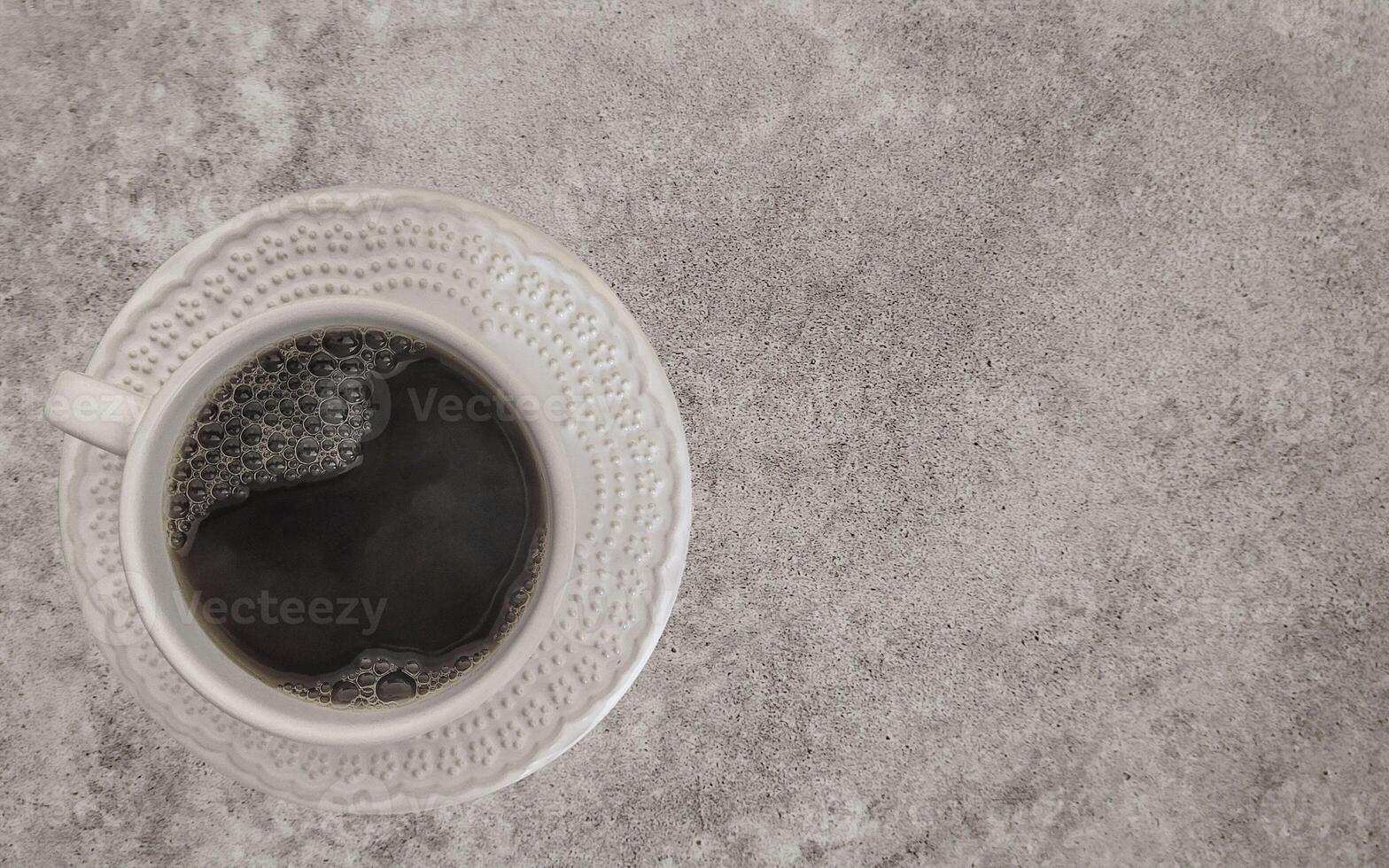 coffee with white cup with dark background written 2023, happy new year 2023 photo