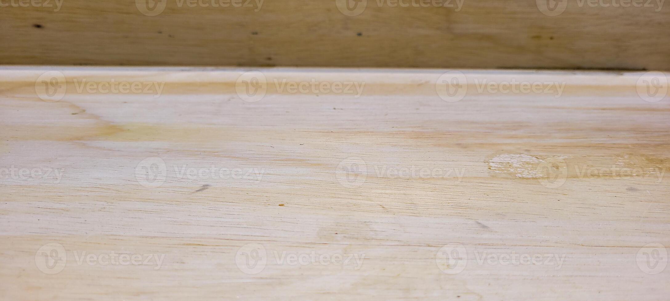 light rustic wood panel with veins and illuminated photo