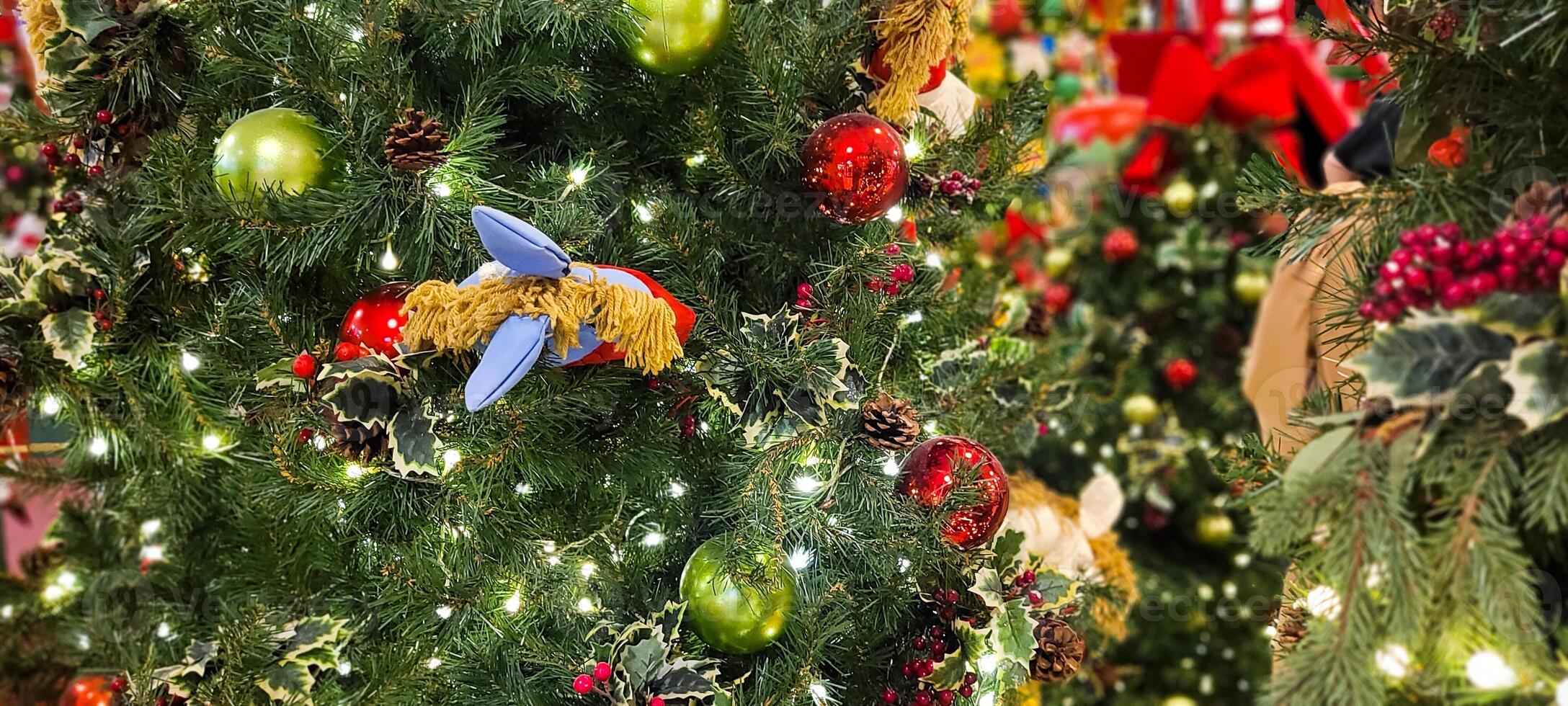 decorated and illuminated christmas tree, merry christmas 2023 photo
