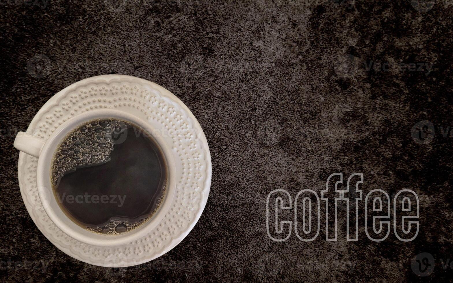 coffee with white cup with dark background written 2023, happy new year 2023 photo