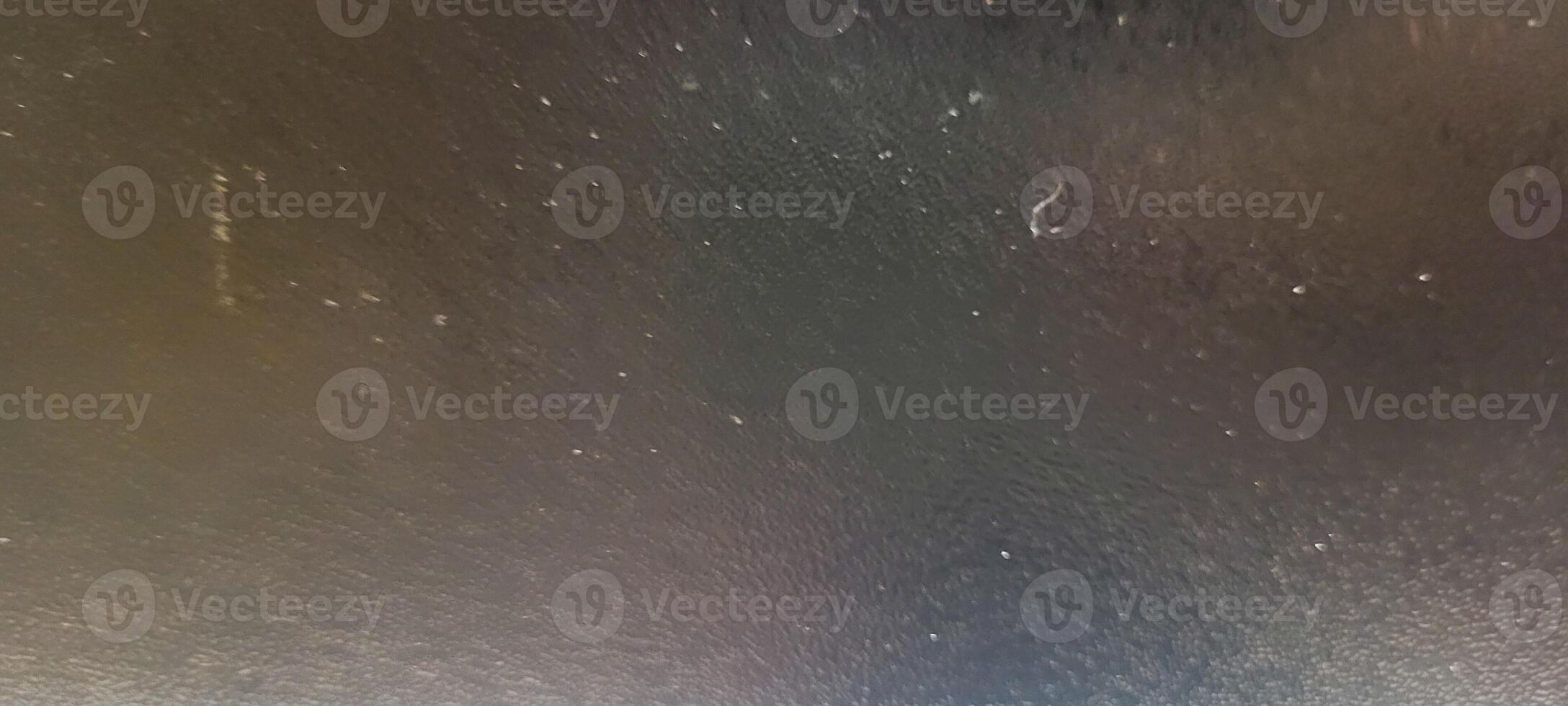 rustic dark background with gray burnt cement floor texture photo