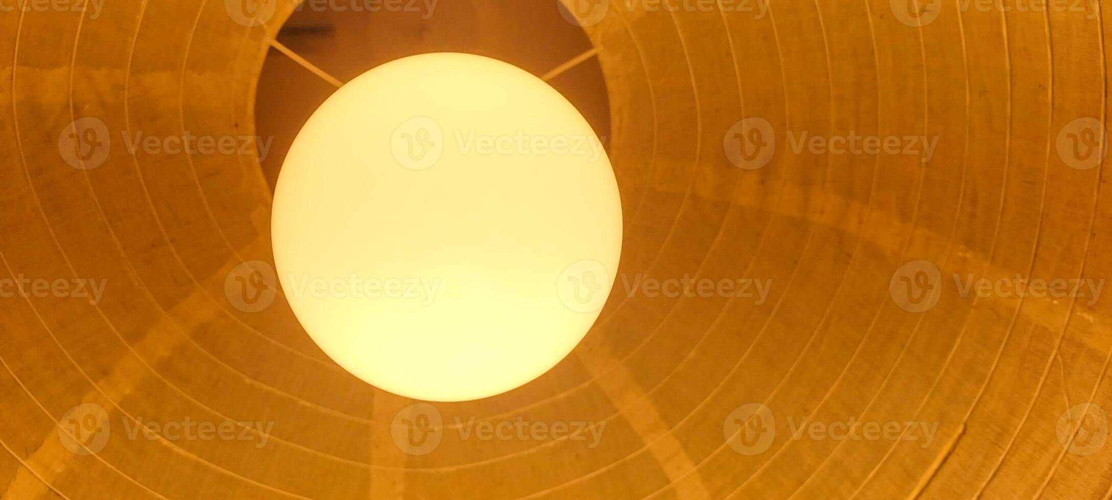 lamp with decorative yellow lamp and chandelier photo