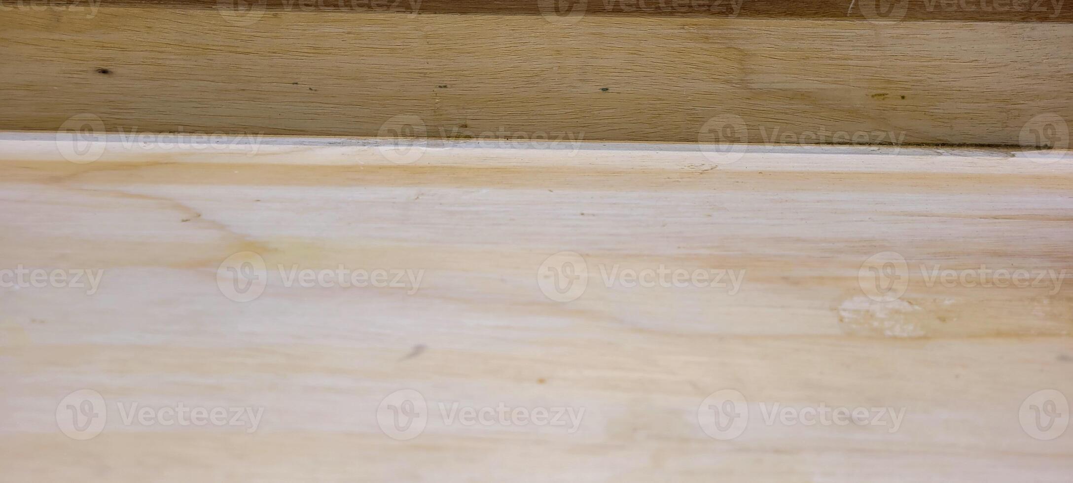 light rustic wood panel with veins and illuminated photo