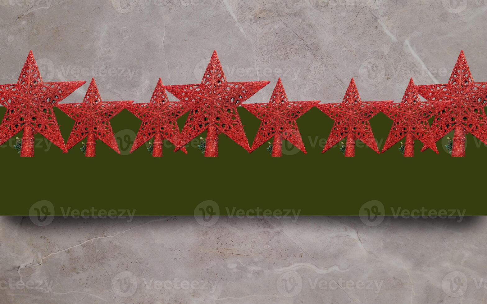 merry christmas message with christmas decoration with stars christmas tree and merry christmas text,christmas greeting card,red stars with christmas lighting photo
