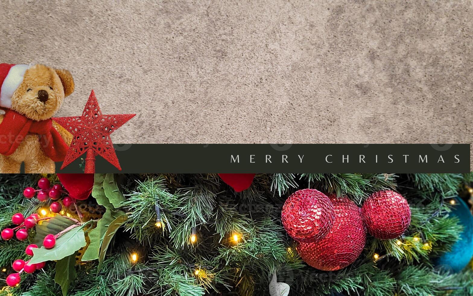 merry christmas message with christmas decoration with stars christmas tree and merry christmas text,christmas greeting card,red stars with christmas lighting photo