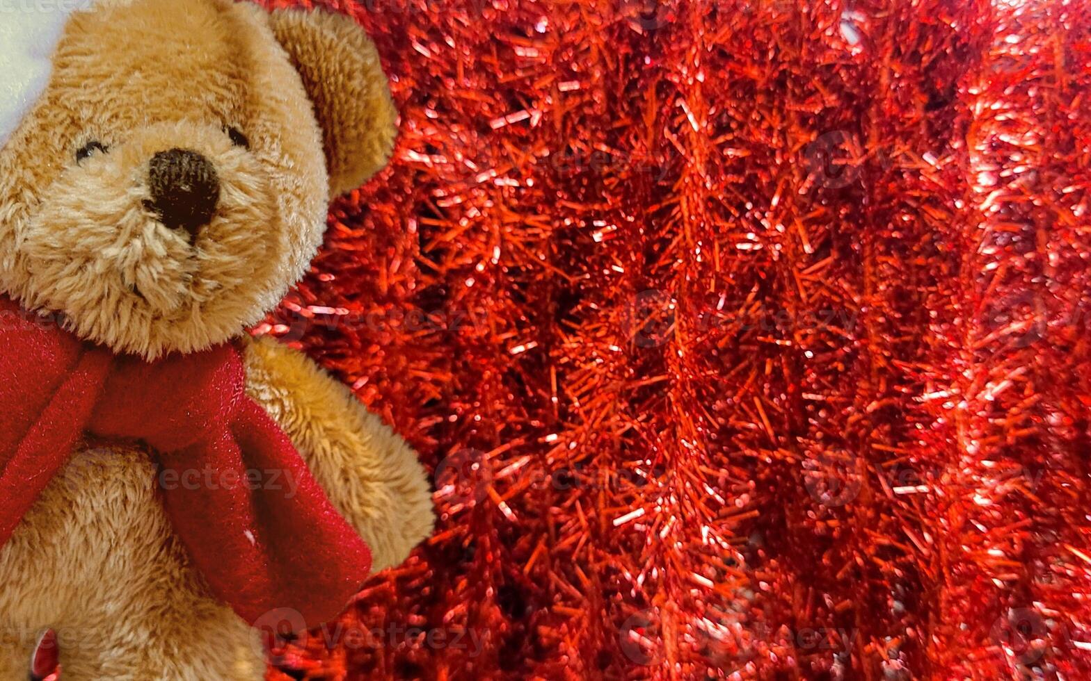 christmas teddy bear with red christmas background with christmas stars,christmas gift with merry christmas message,colorful christmas background photo