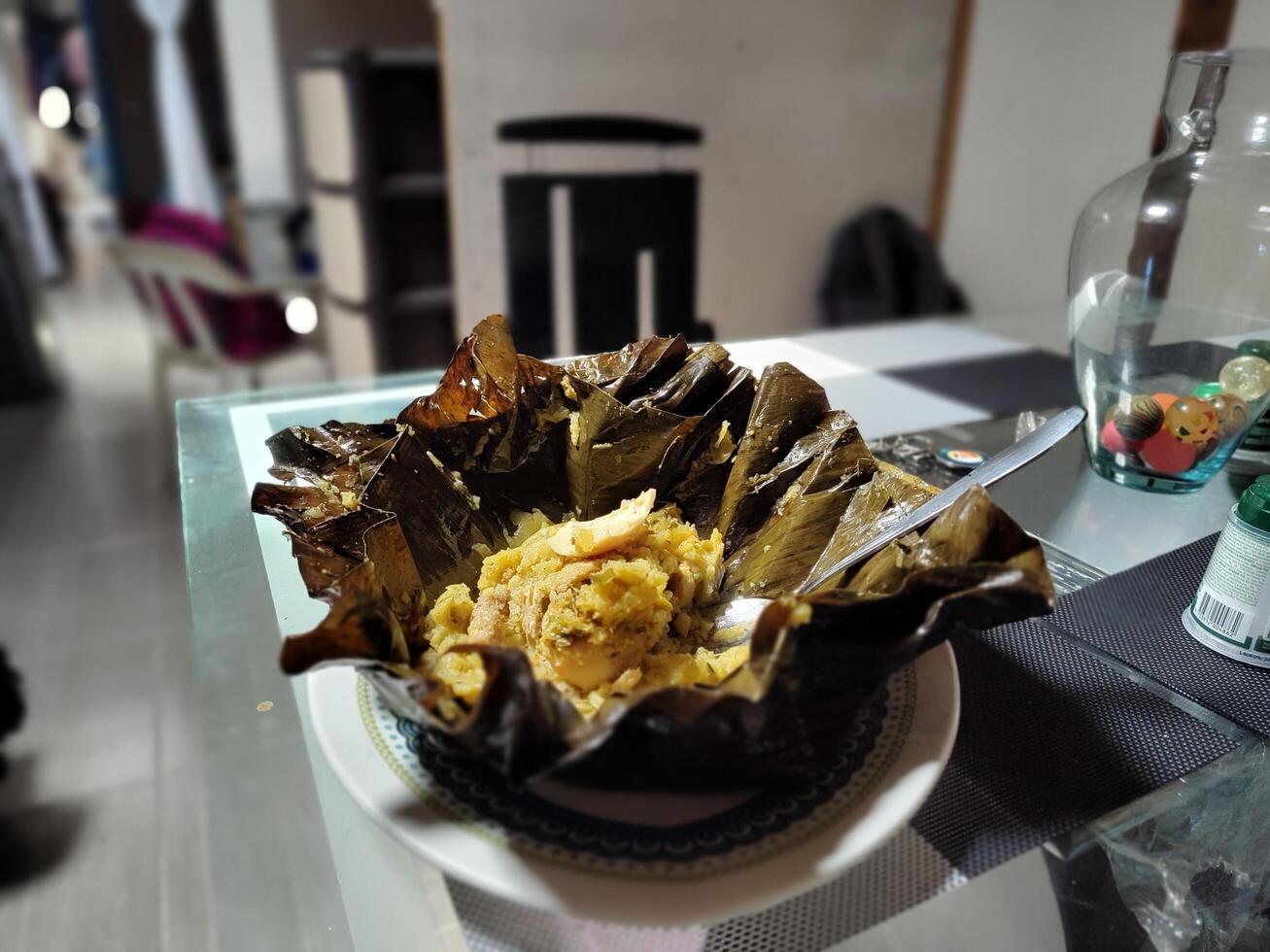 Typical Colombian food on the table, tamale from Tolima photo