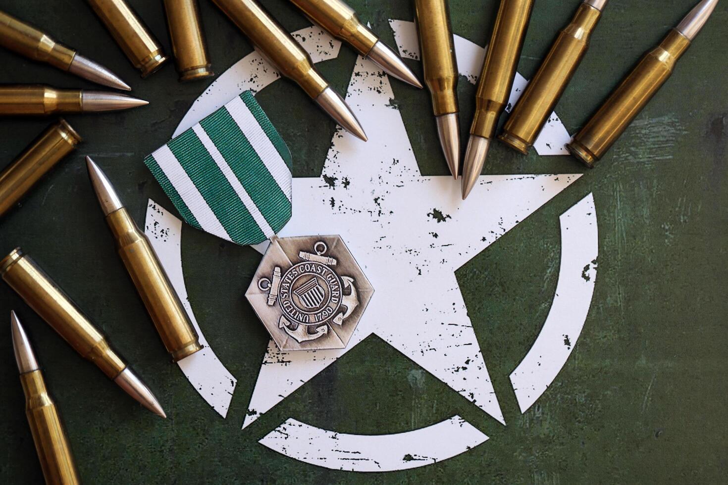 KYIV, UKRAINE - JULY 10, 2024 The Coast Guard Commendation medal. United States military award medal with ribbon and pin. Handmade paper theater props photo