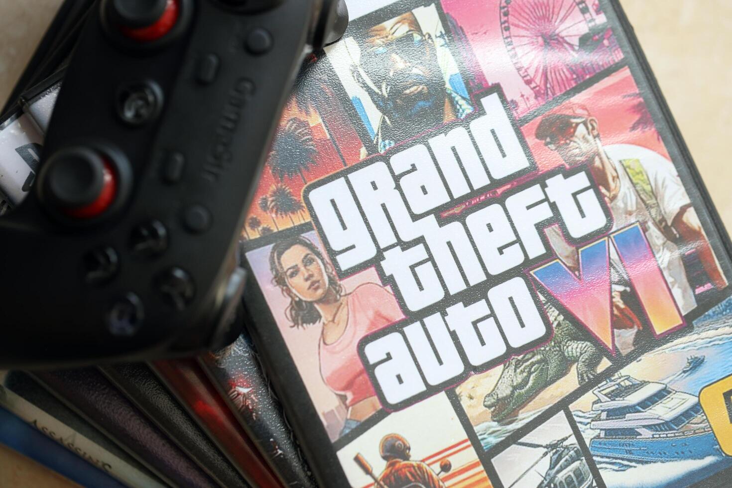 KYIV, UKRAINE - JUNE 26, 2024 Grand Theft Auto 6 PS5 game disc box for console gaming. Fictional fan-made game disc pack cover photo
