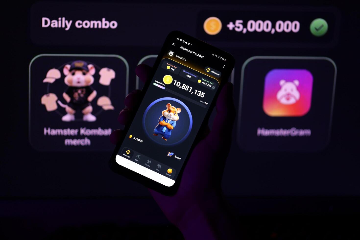 KYIV, UKRAINE - APRIL 20, 2024 Hamster Kombat telegram bot on smartphone screen. Hamster Kombat is a viral Telegram-based crypto game for earn HMSTR tokens by managing virtual crypto exchange photo