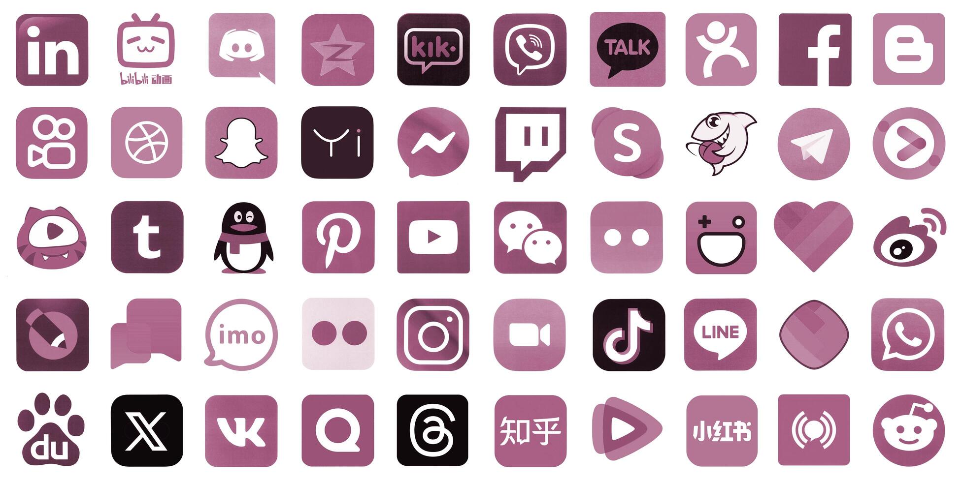 KYIV, UKRAINE - APRIL 1, 2024 Many icons of social media, messengers, sharing platforms photo