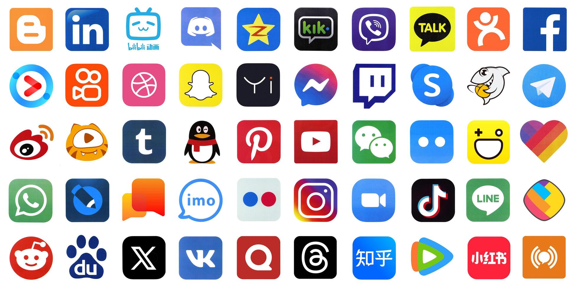KYIV, UKRAINE - APRIL 1, 2024 Many icons of social media, messengers, sharing platforms photo
