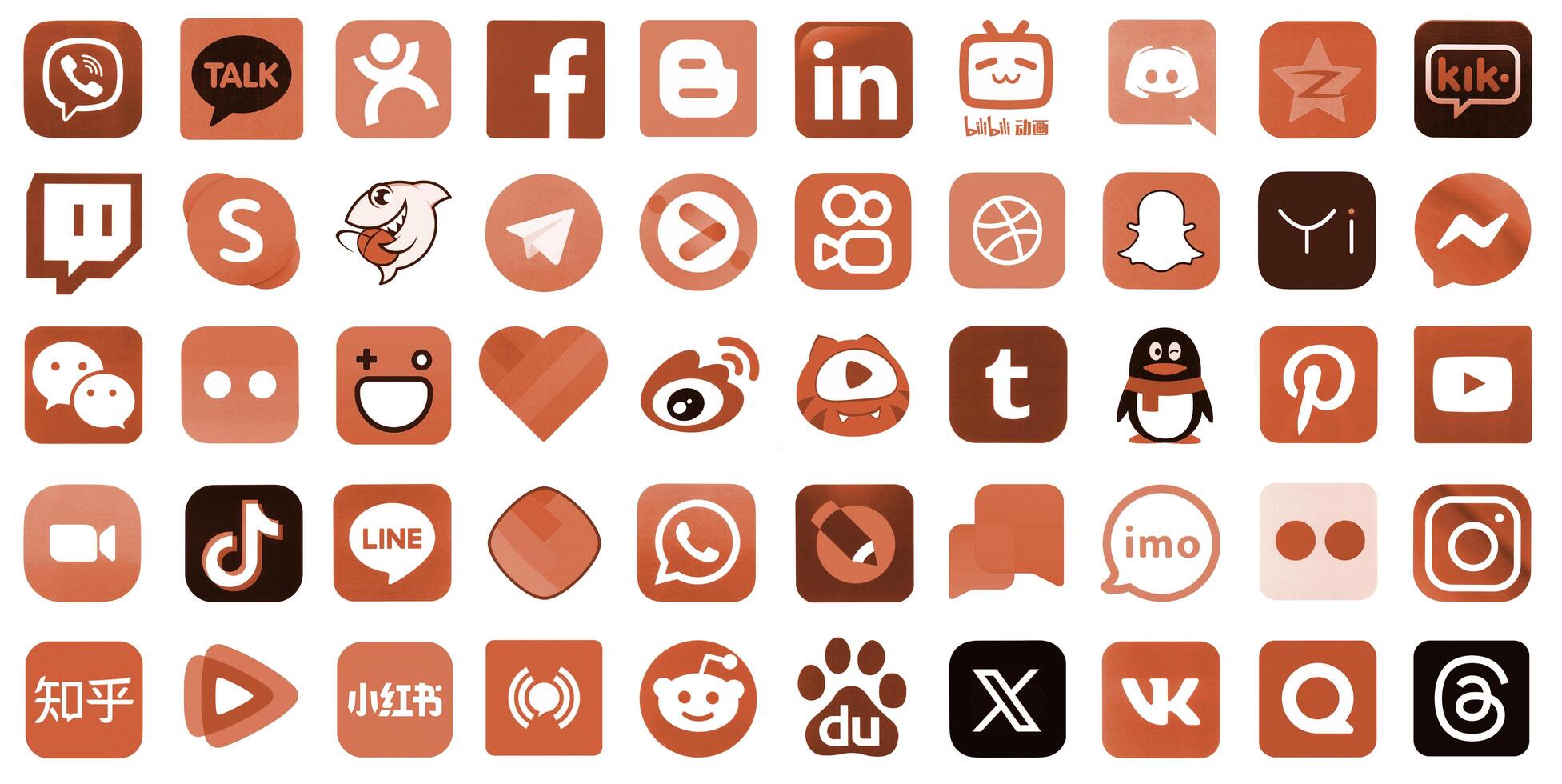 KYIV, UKRAINE - APRIL 1, 2024 Many icons of social media, messengers, sharing platforms photo