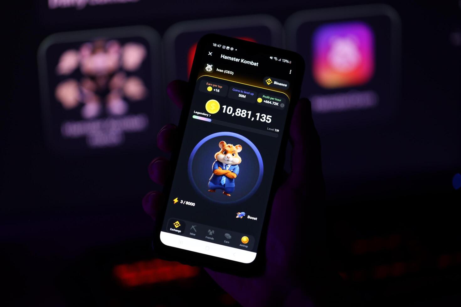 KYIV, UKRAINE - APRIL 20, 2024 Hamster Kombat telegram bot on smartphone screen. Hamster Kombat is a viral Telegram-based crypto game for earn HMSTR tokens by managing virtual crypto exchange photo