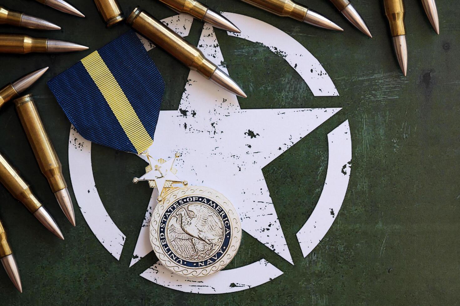 KYIV, UKRAINE - JULY 10, 2024 US Navy Distinguished Service medal. United States military award medal with ribbon and pin. Handmade paper theater props photo