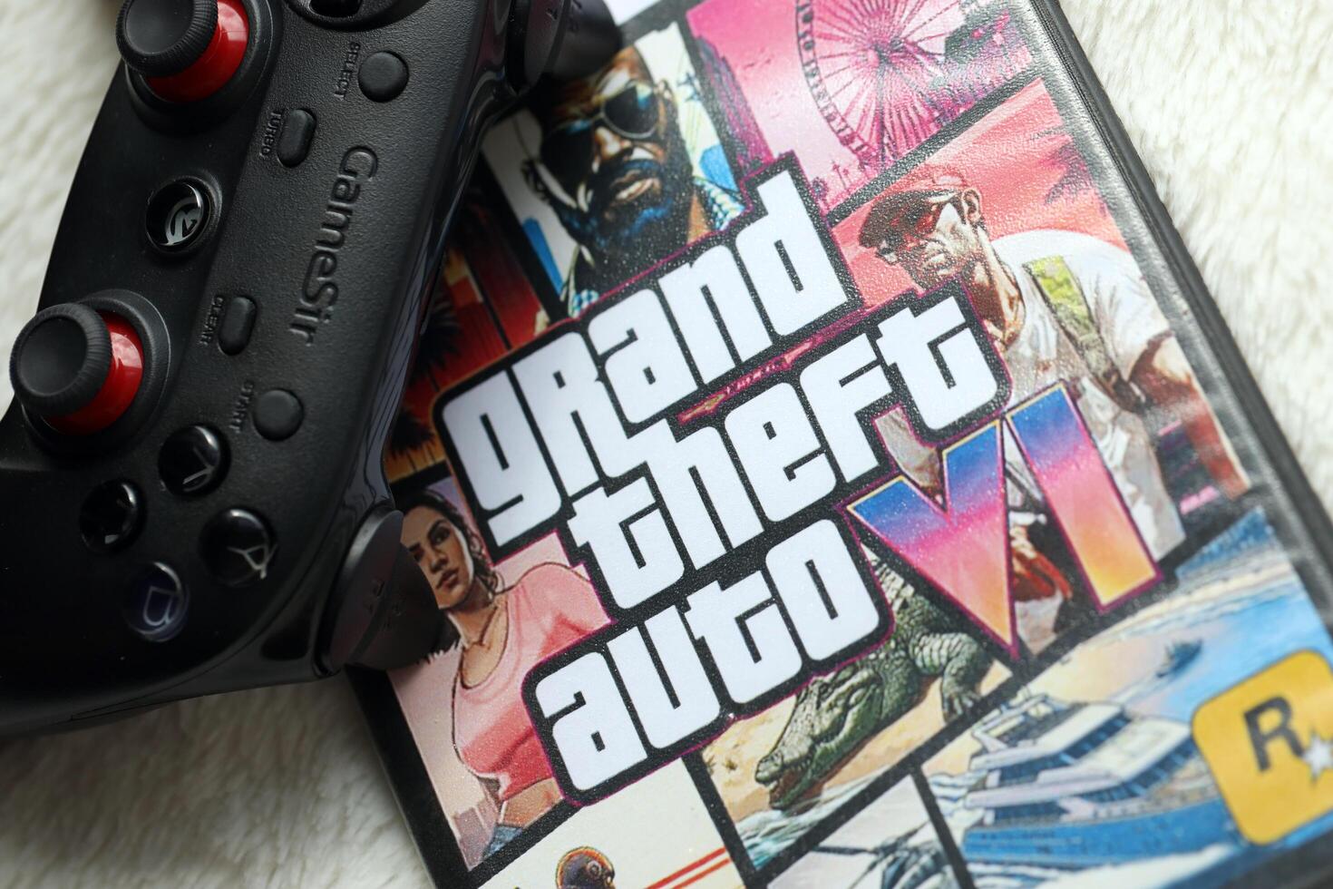 KYIV, UKRAINE - JUNE 26, 2024 Grand Theft Auto 6 PS5 game disc box for console gaming. Fictional fan-made game disc pack cover photo