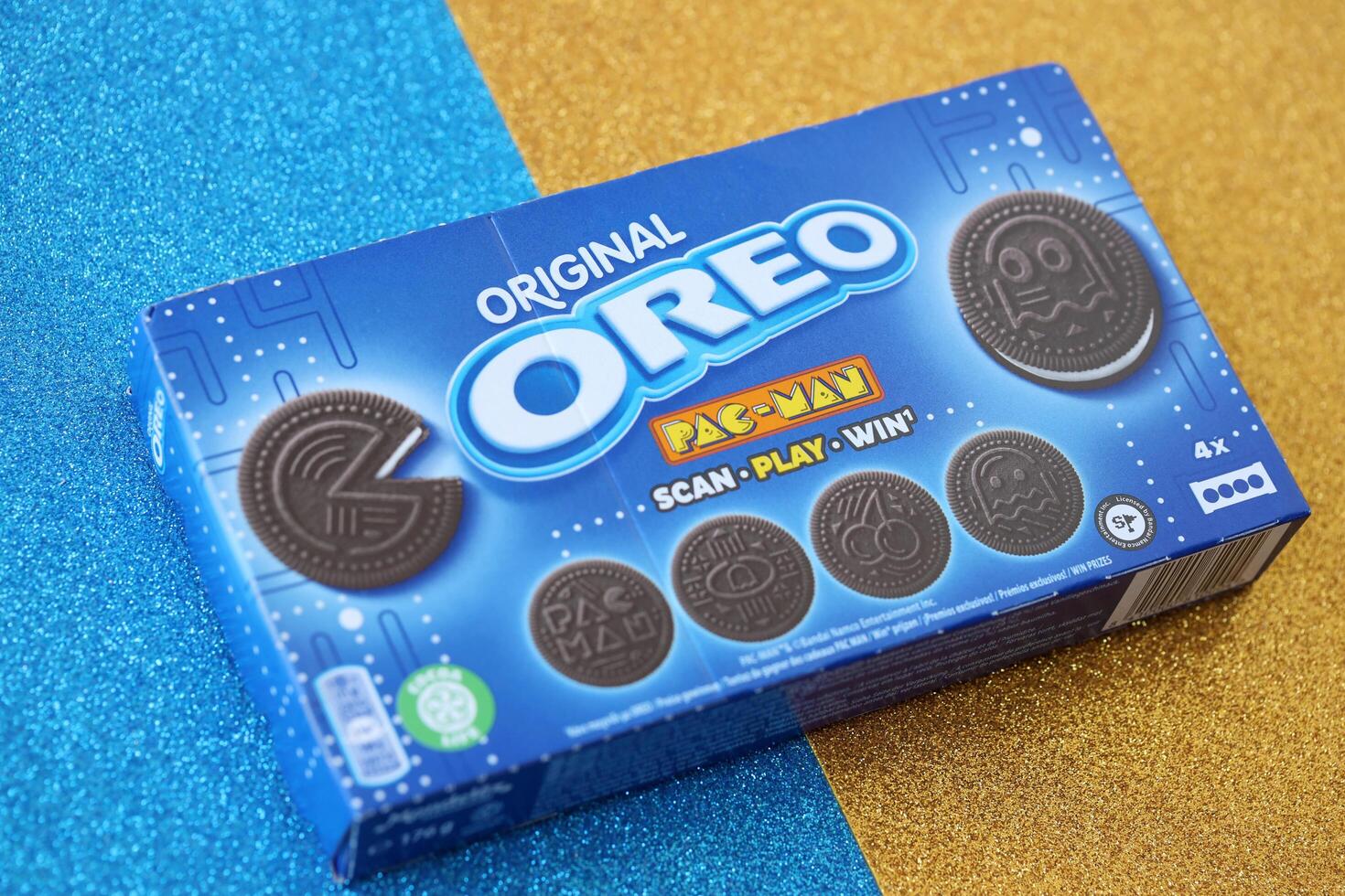 KYIV, UKRAINE - APRIL 20, 2024 Oreo pac-man crispy cookies packs. The brand Oreo owned by american company Mondelez international photo