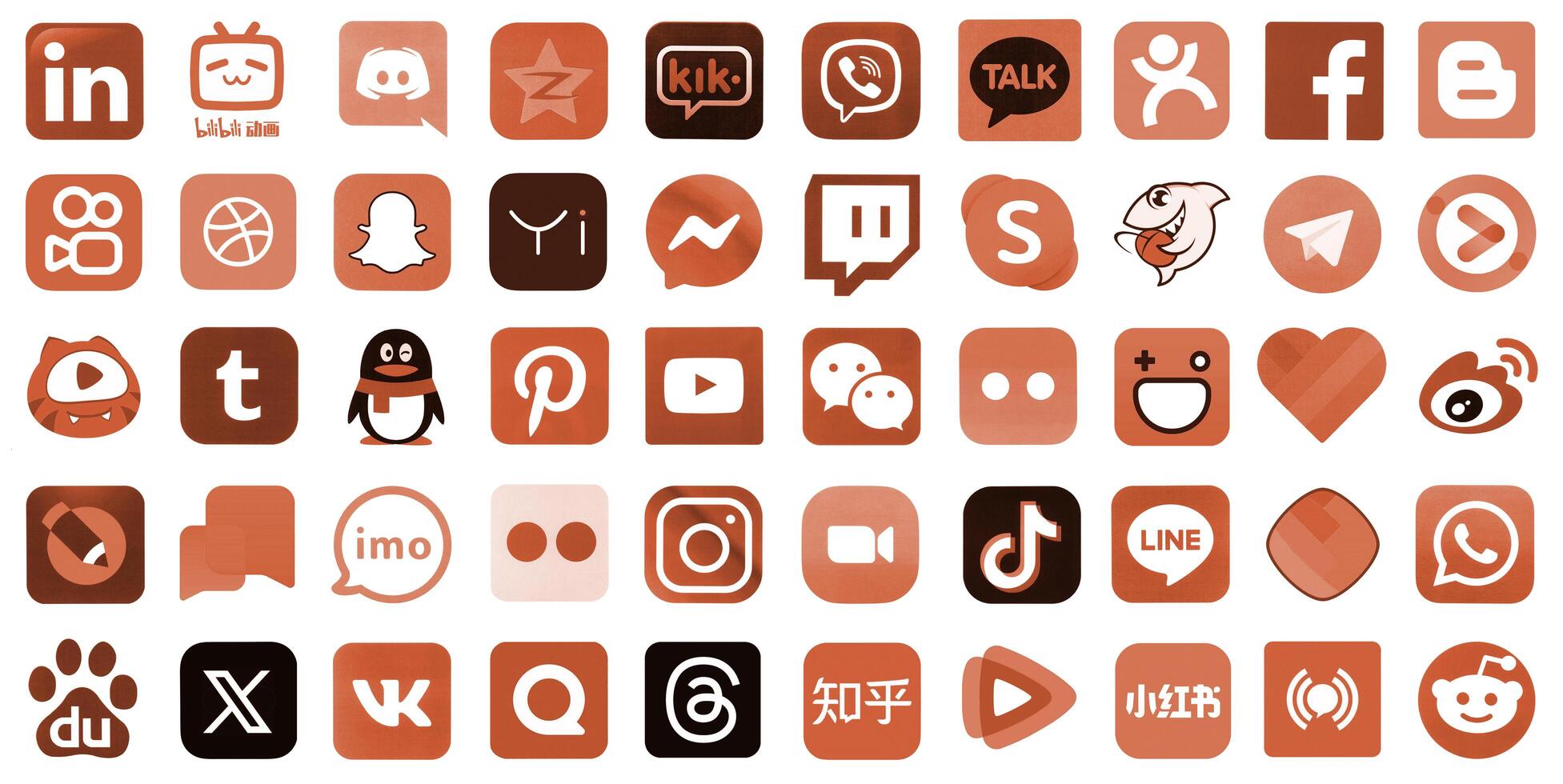 KYIV, UKRAINE - APRIL 1, 2024 Many icons of social media, messengers, sharing platforms photo