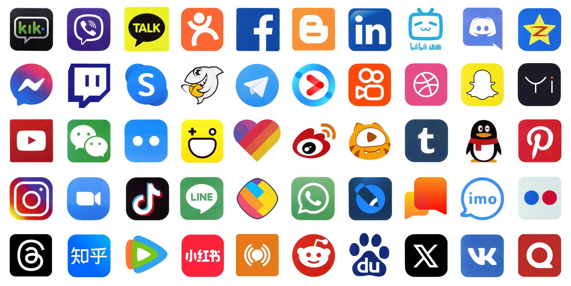 KYIV, UKRAINE - APRIL 1, 2024 Many icons of social media, messengers, sharing platforms photo