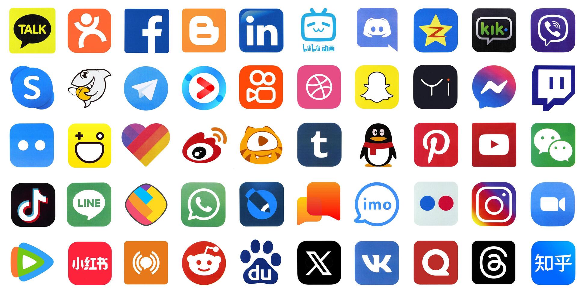 KYIV, UKRAINE - APRIL 1, 2024 Many icons of social media, messengers, sharing platforms photo
