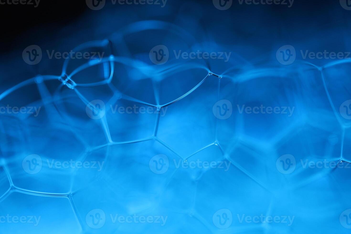 Blue bubbles in macro, connection of bubbles in macro, cell from liquid, molecules connection photo