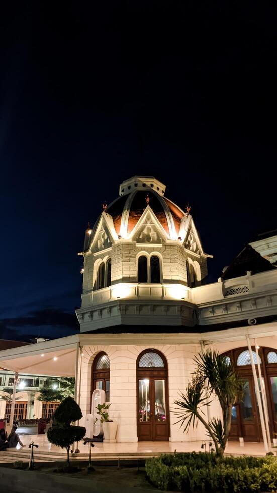 Surabaya Indonesia, April 14 2024.View of the Balai Pemuda Surabaya building at night. Balai Pemuda or Surabaya Youth Center is one of the historical buildings in Surabaya. photo