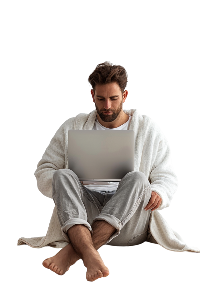 Man with crossed legs using laptop alone against transparent background png