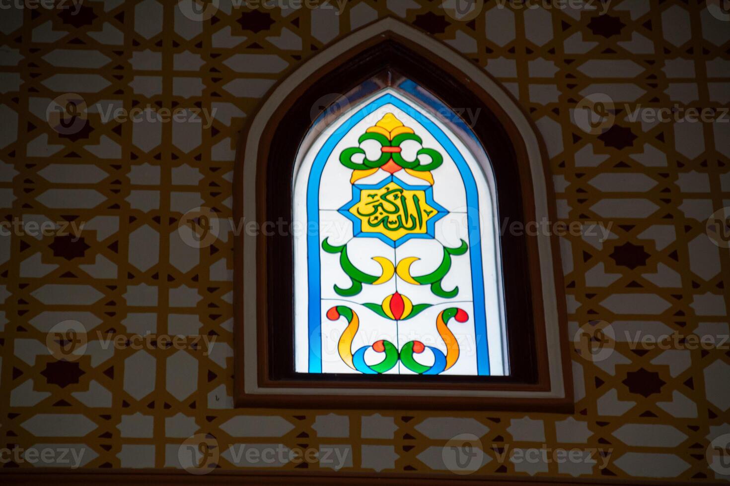 Arabic calligraphy decoration of the names of Allah and Muhammad in Islamic architectural decoration photo