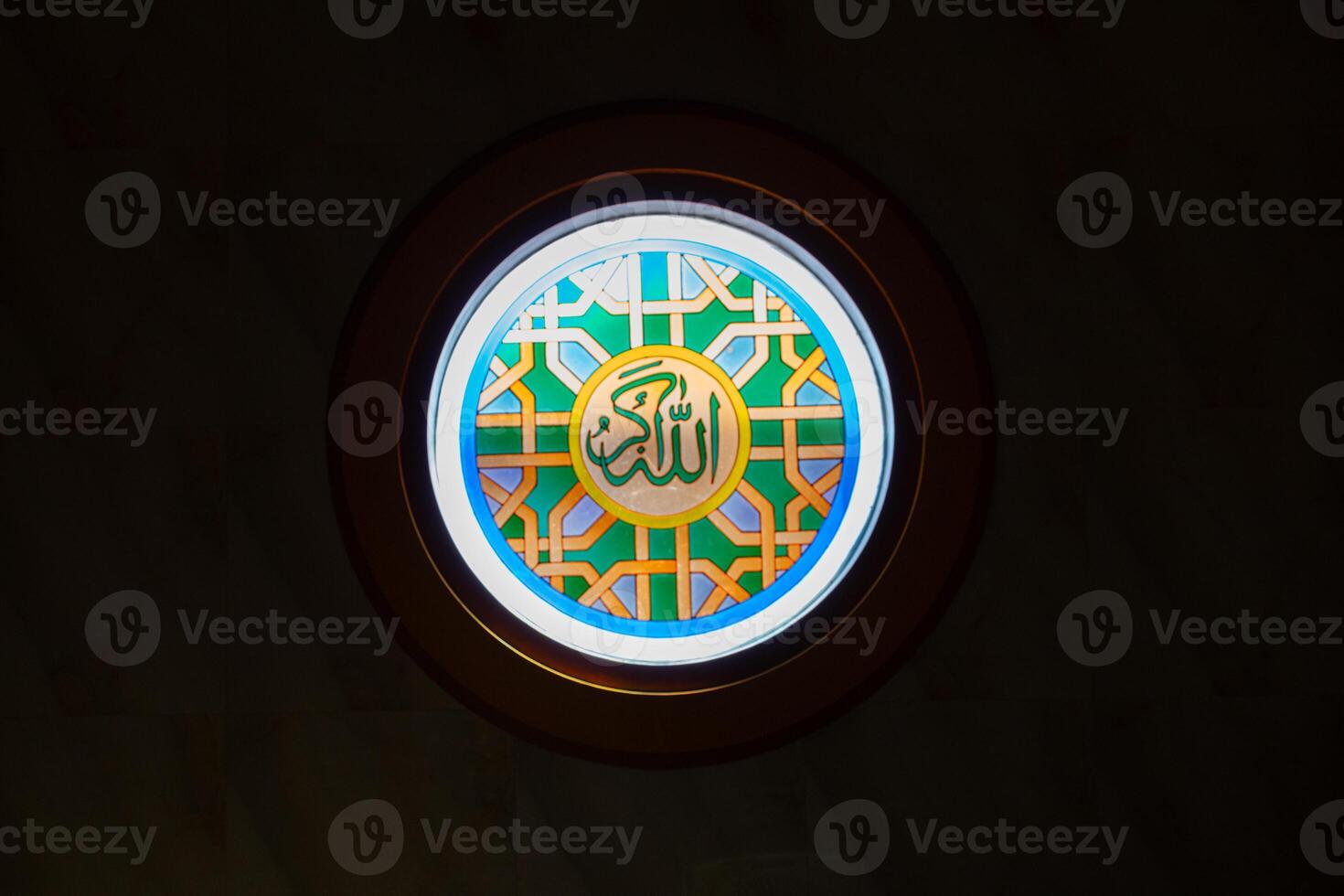 Arabic calligraphy decoration of the names of Allah and Muhammad in Islamic architectural decoration photo