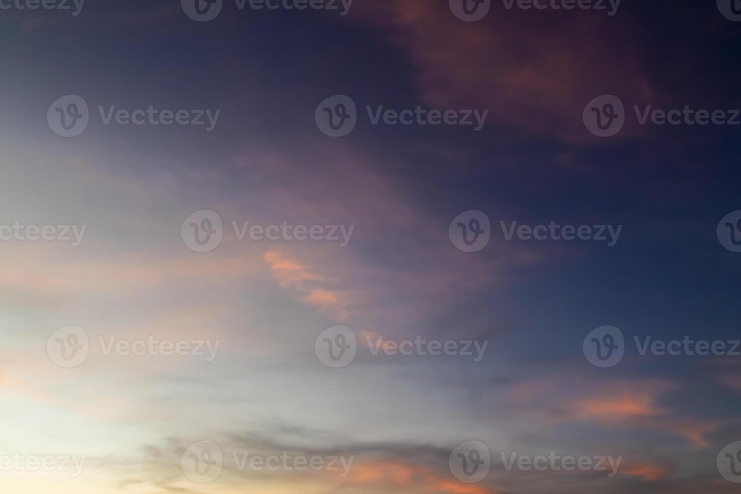 Clouds with warm light and blue sky in the afternoon photo