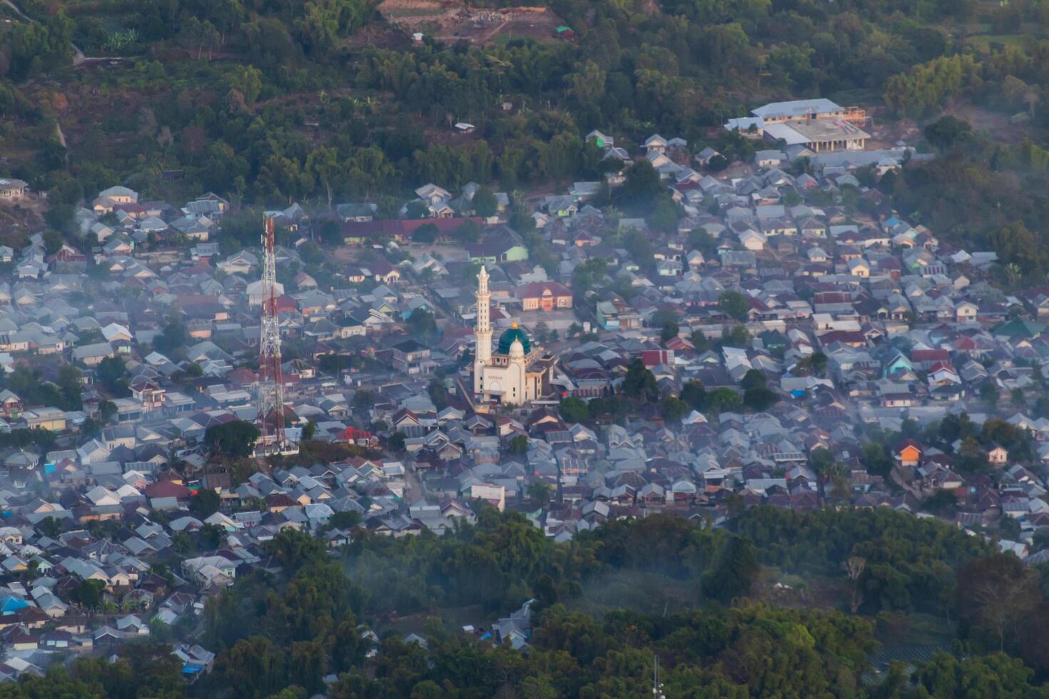 View of Sembalun village with a thin mist in the morning photo