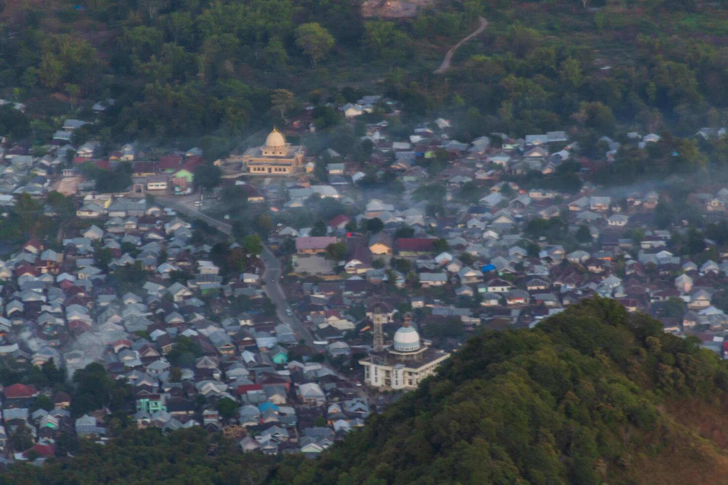 View of Sembalun village with a thin mist in the morning photo