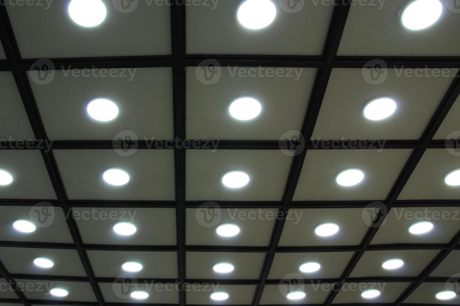 decorative grid ceiling with LED lighting indoors photo