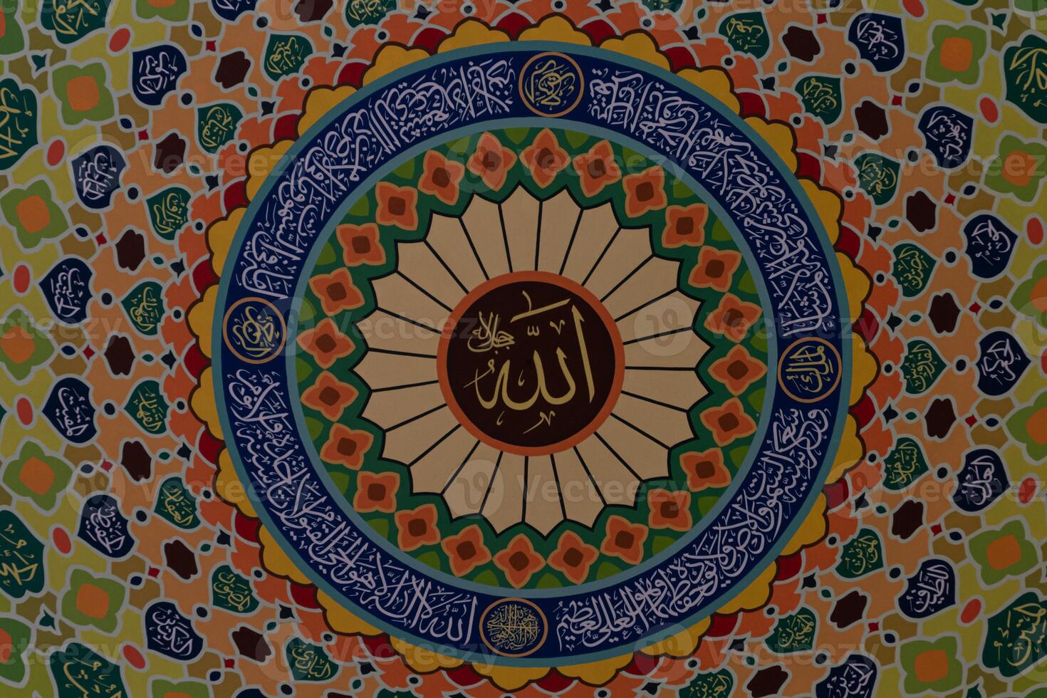 Arabic calligraphy decoration of the names of Allah and Muhammad in Islamic architectural decoration photo